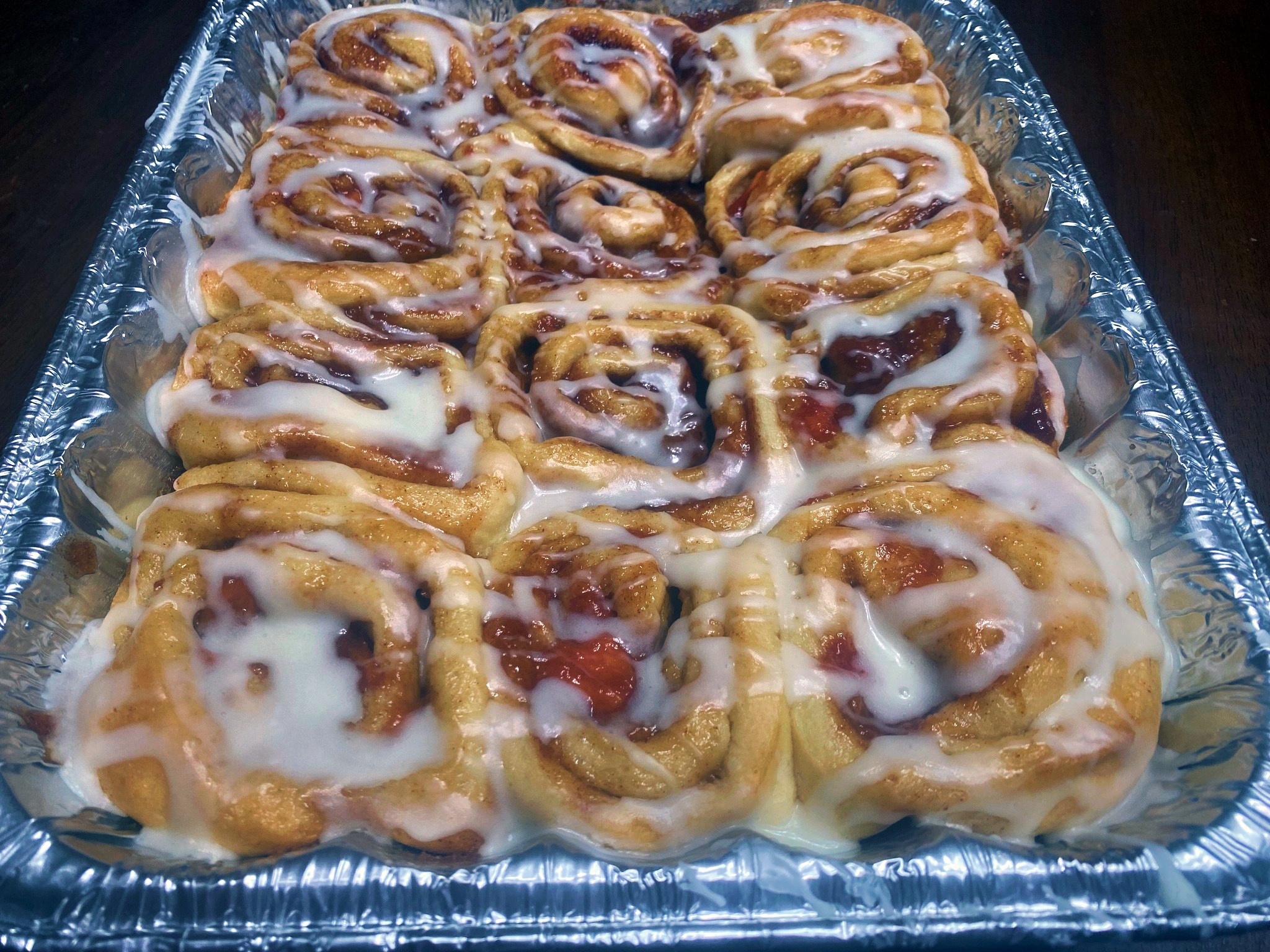 One dozen fresh peach pie cinnamon rolls from My Table of Three.