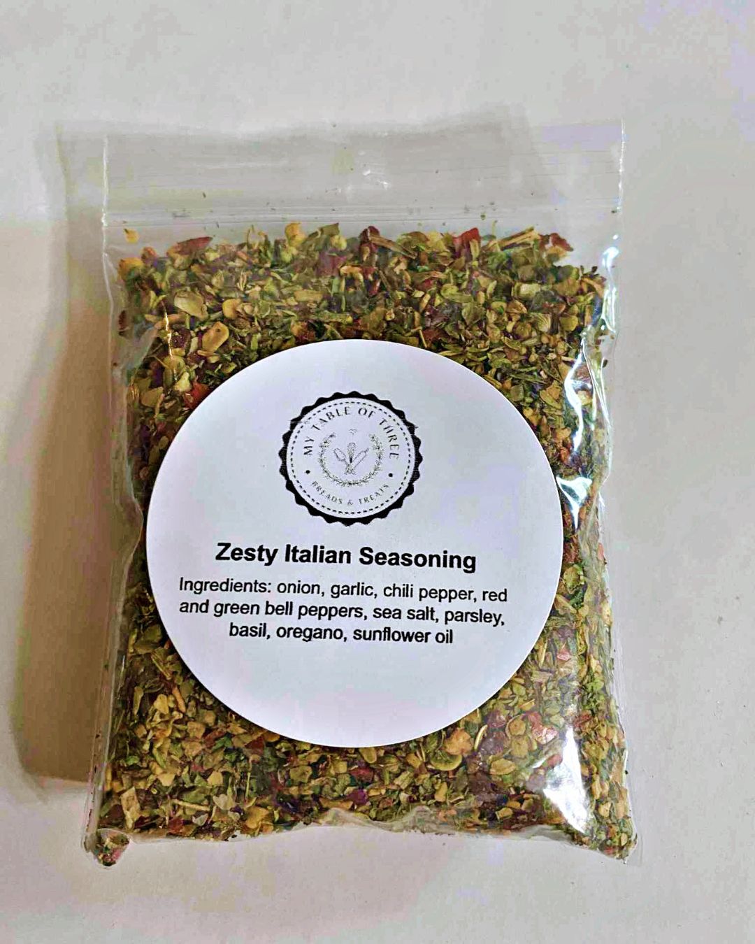 Small 1 ounce clear bag filled with Zesty Italian Seasoning.