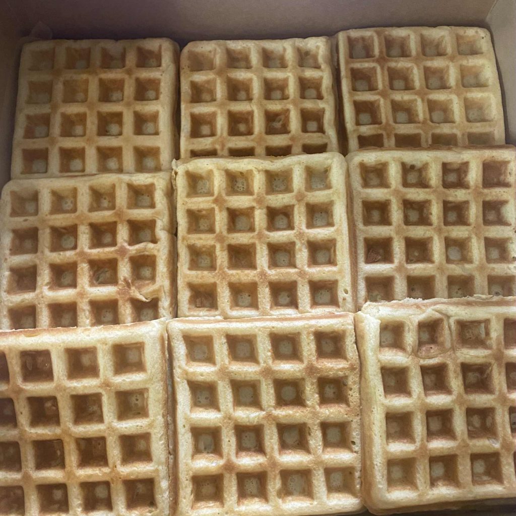 A photo of 9 square Belgian Waffles.