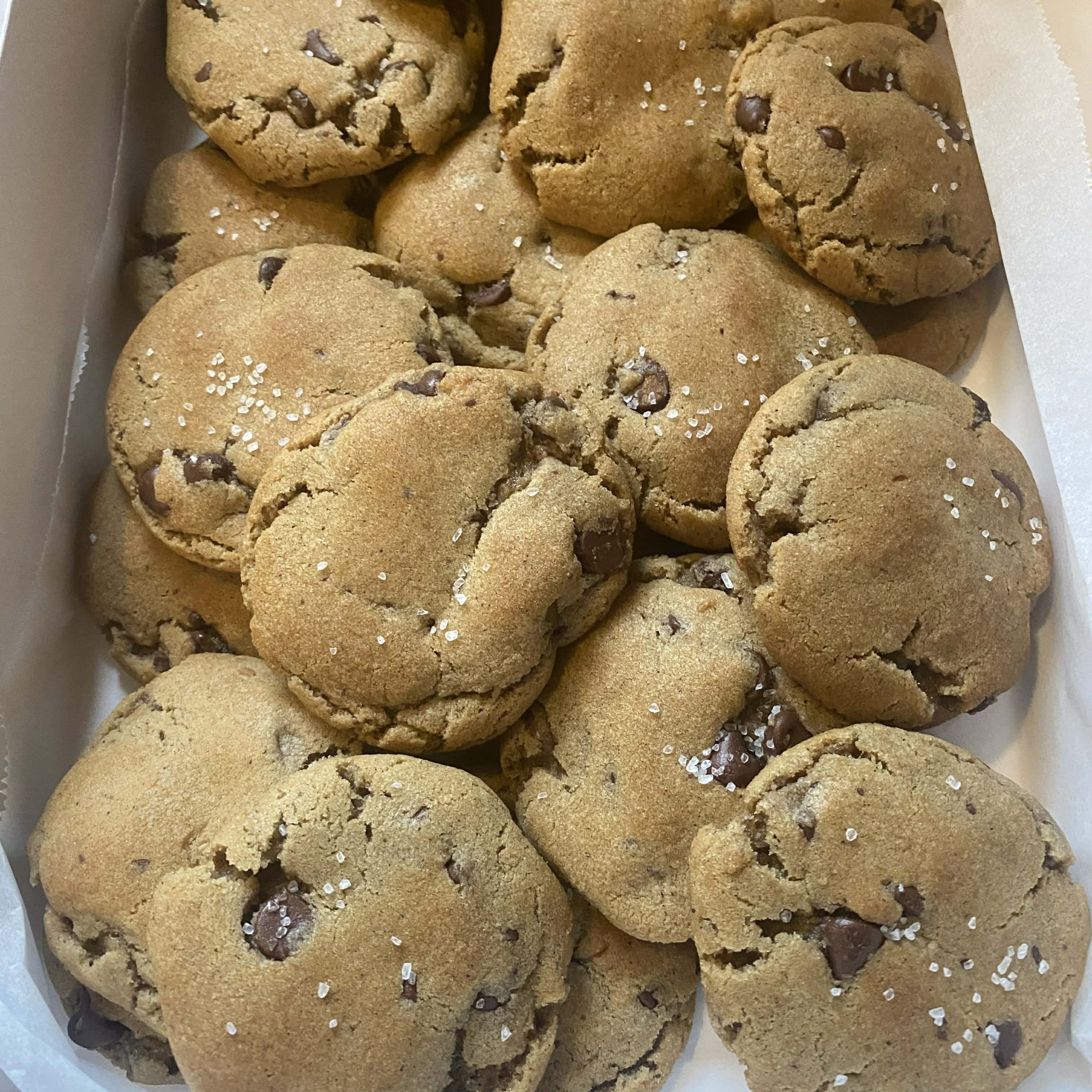 Two Doze Brown Butter Chocolate Chip Cookies with flaky salt on top.