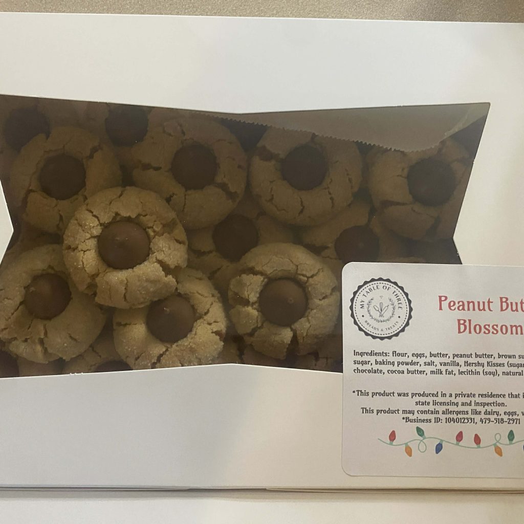 Two dozen Peanut Butter Blossom Cookies in a white bakery box with a label.