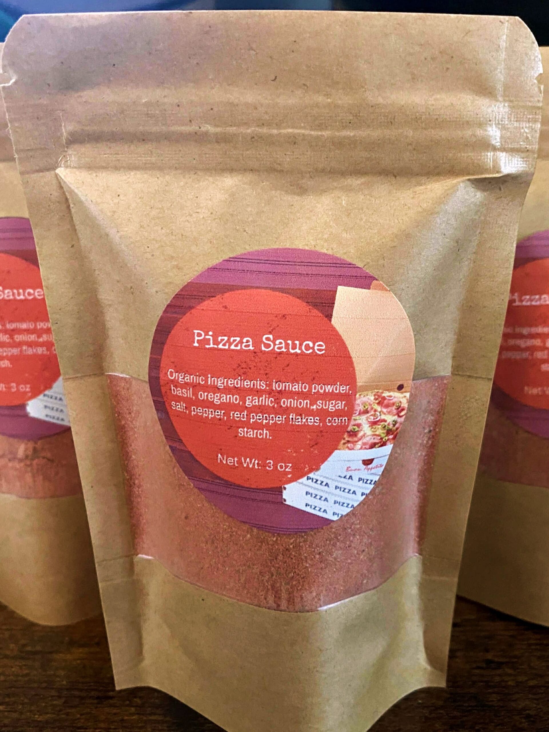 A 3 ounce packet of Organic Pizza Sauce Mix.