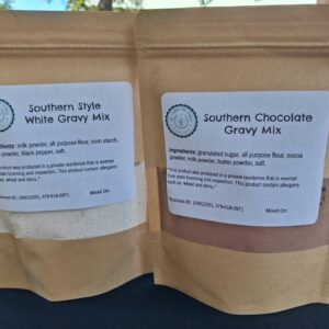 Two gravy mixes in packages with labeling.