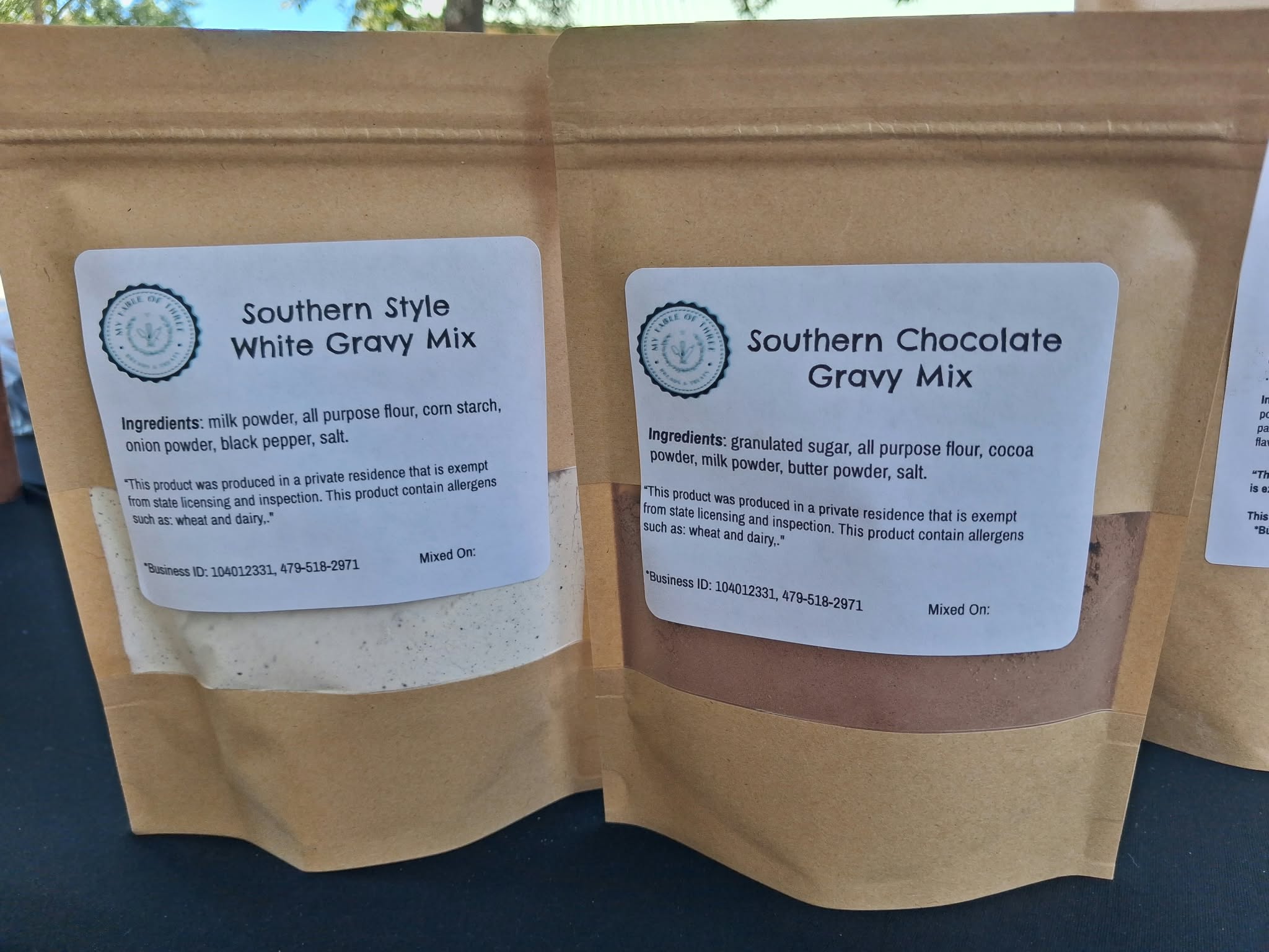 Two gravy mixes in packages with labeling.